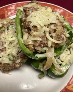 House Stuffed Peppers with a Creamy Tomato Sauce