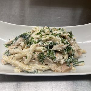 Pasta with Sausage, Parmesan, Sweet Peas, Onion and Roasted Garlic